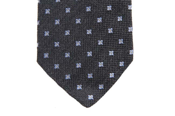 Battisti Tie: Charcoal grey with small lavender pattern, pure wool