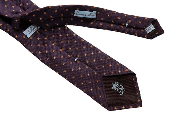 Battisti Tie: Purple with small bronze pattern, pure wool