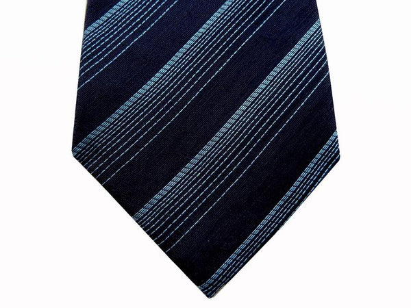 Battisti Tie: Navy with light blue varied stripes, 1-button & pocket, pure silk