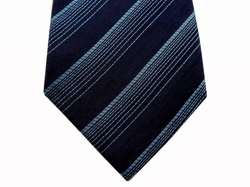 Battisti Tie: Navy with light blue varied stripes, 1-button & pocket, pure silk