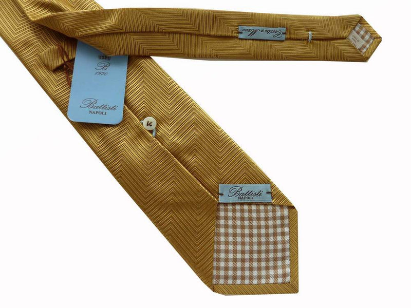 Battisti Tie: Gold herringbone weave, 1-button & pocket, pure silk