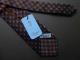 Battisti Tie: Brown with light blue square floral pattern, pure silk