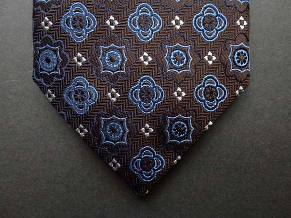 Battisti Tie: Brown with blue woven pattern, pure silk