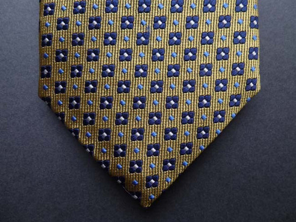 Battisti Tie: Dull yellow with navy floral pattern, pure silk