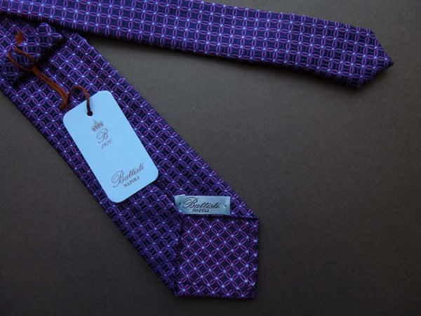 Battisti Tie: Dark navy with violet circular pattern, pure silk
