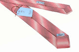Battisti Tie: Pink rainbow shades with tan and black geometric pattern, pure silk